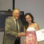 Aliana Heine shakes hands with Bill Archer.